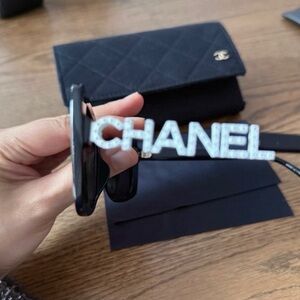 CHANEL Black Sunglasses with White Lettering